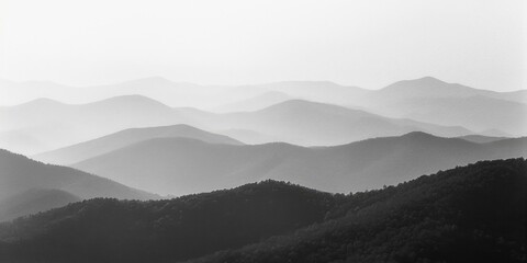 A stunning black and white photo of a majestic mountain range. Perfect for nature and landscape...
