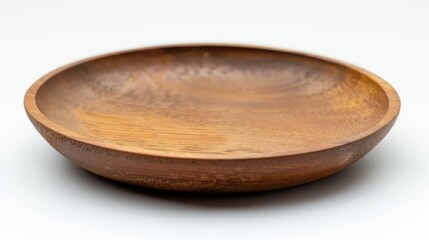 A close-up of a wooden bowl on a table, ideal for food and cooking concepts