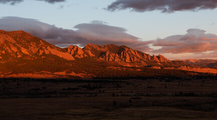 Alpenglow on the flatirons in Colorado