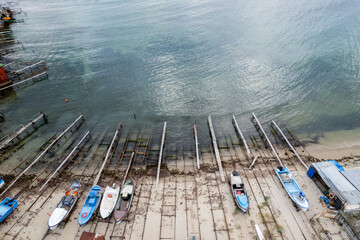 Fishing boats on the seashore. Top view and Take from drone.