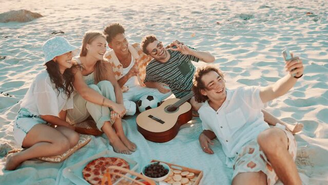Young people, selfie and vacation at beach and bonding together on travel adventure on summer break. Friends, diversity and cellphone by sea for picnic and profile picture of guitar on social media