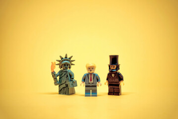 Naklejka premium Statue of Liberty, Lincoln and Trump. Democracy concept. Illustrative editorial