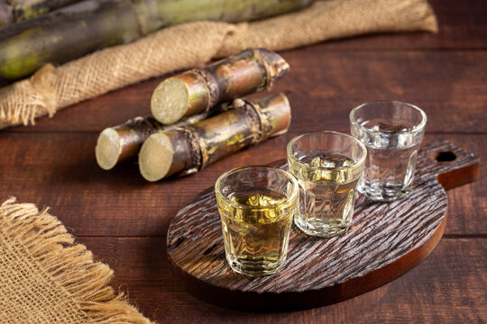 Glasses of cacha&ccedil;a served on the table.