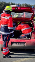 rescuing people trapped in a car, firefighters, hoerstel, germany, nrw, emergency 