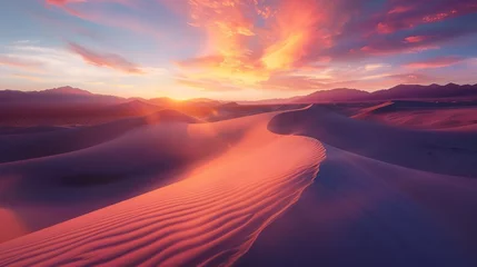 Rolgordijnen Fiery hues of a desert sunset casting long shadows over rolling sand dunes © Dave
