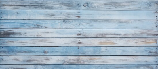Obraz premium Detailed light blue old wooden wall texture with close-up of wood plank fence.