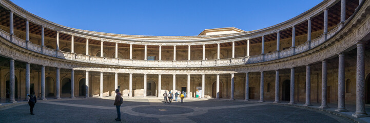 Panorama of courtyard in Palacio de Carlos V at Alhambra, Granada, Andalusia, Spain