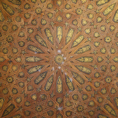 Detail of a brown wooden ceiling in Alhambra, Granada, Andalusia, Spain