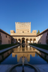 Fototapeta premium Courtyard of the Myrtles Patio de los Arrayanes in fortress Alhambra, Granada, Andalusia, Spain