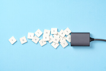 Concept of storing information on ssd disk with falling keyboard keys, symbolizing data storage and technology innovation.