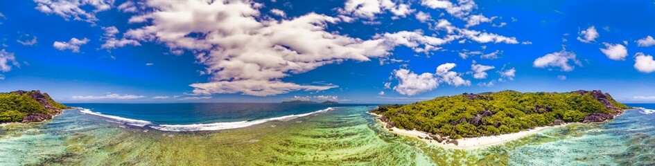 Seychelles, Africa. Panoramic aerial view of La Digue Island on a sunny day - 756802176