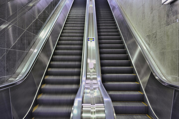 Tokyo, Japan - January 25, 2024: An empty escalator in Shinjuku, Tokyo, Japan
