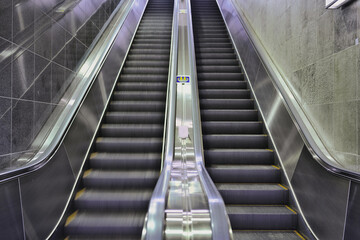 Tokyo, Japan - January 25, 2024: An empty escalator in Shinjuku, Tokyo, Japan
