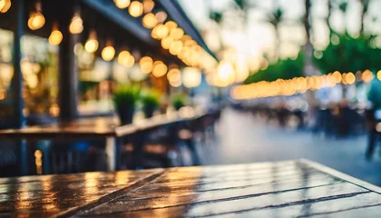 Behangcirkel street bar or outdoor restaurant cafe terrace evening bokeh background generative ai © Roger