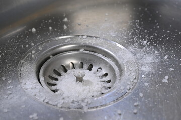 Lifehacks; Baking soda poured to unclog drainage system at home   