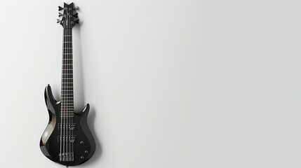 A bass guitar with a sleek black finish, presented against a solid white background for a powerful...