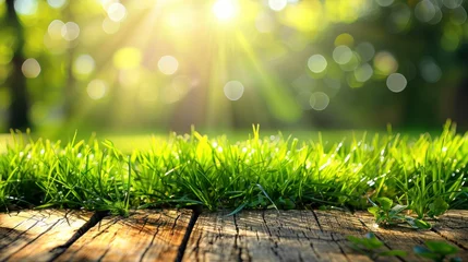 Zelfklevend Fotobehang Fresh spring green grass with green bokeh and sunlight and wood floor. Beauty natural background - generative ai © Nia™