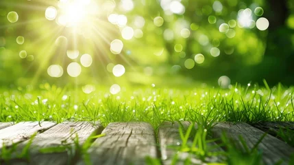 Foto auf Alu-Dibond Fresh spring green grass with green bokeh and sunlight and wood floor. Beauty natural background - generative ai © Nia™