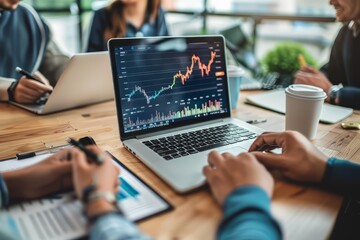 People showing bitcoin on laptop computer. Cryptocurrencies. Business