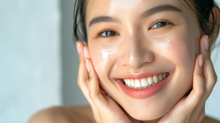 Beautiful Japanese woman in her 20s doing skin care, clear white skin and glossy lips, close-up　スキンケアする美しい女性
