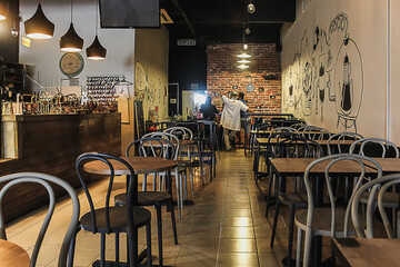 modern Shah Alam's restaurant with open kitchen and beautiful doodle decoration on the wall
