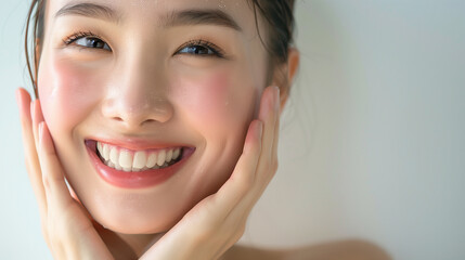 Beautiful Japanese woman in her 20s doing skin care, clear white skin and glossy lips, close-up　スキンケアする美しい女性
