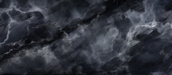 High-resolution black marble texture with a natural pattern for wallpaper and design artwork.