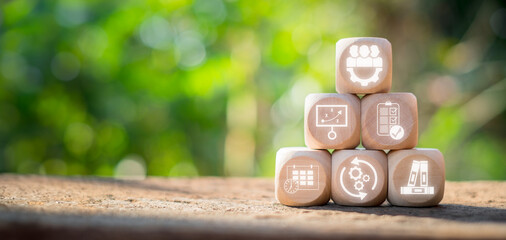 Workflow concept, Wooden block on desk with workflow icon on virtual screen.