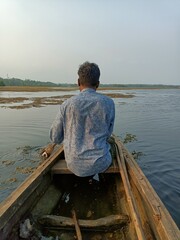 Exploring the majestic backwaters of Kerala India on a man powered boat.