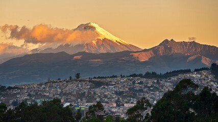 South-east of the city of Quito and the Cotopaxi volcano (5897m) illuminated by a golden sunset...