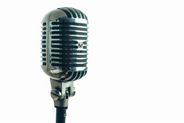 Fototapeta premium A close-up view of a antique microphone, isolated white background.