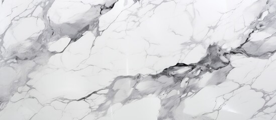 A close up of a freezing white marble texture resembling snow on a slope, creating a monochrome winter landscape event. The ice cap and water elements enhance the liquid effect