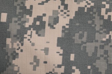 Texture of camouflage fabric as background, top view