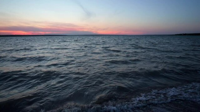 A wonderful sunset on the shore of the lake