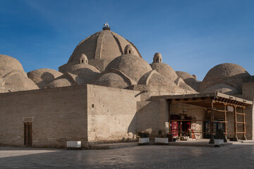 Traditional indoor bazaar in the historical center of Toki Zargaron on a sunny day, Bukhara, Uzbekistan