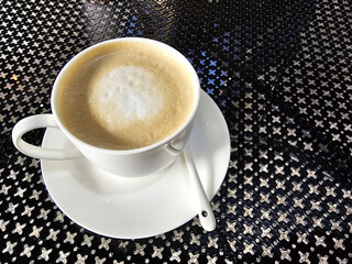 White Cup of Coffee on the Breakfast Table.
