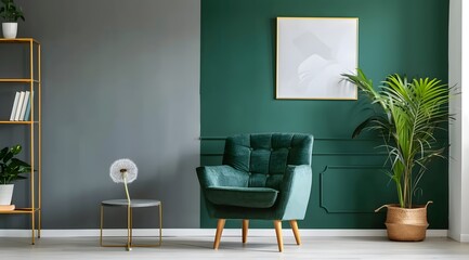 Green armchair between dandelion and plant in living room interior with copy space and grey painting