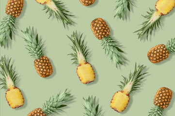 Chaotic pineapple pattern of minimal style.Colorful pattern made on pastel yellow background. Contemporary style. Creative art, minimal aesthetics.Minimal tropical fruit summer concept.Pop art design