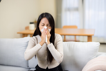 Woman flu and sneeze at home