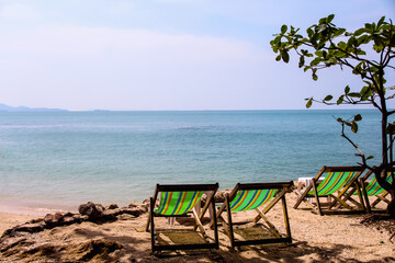 Fototapeta na wymiar Landscape sea view with colorful beach chair on sand beach background