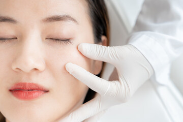 Cosmetic surgery advice about surgery face. beauty asian smile and happy after surgery, skin...