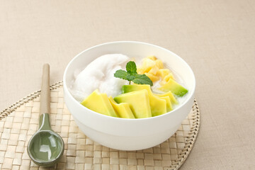 Es teler or es teller, Indonesian dessert, consist of avocado, young coconut, jackfruit, served...