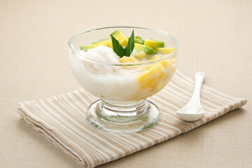 Es teler or es teller, Indonesian dessert, consist of avocado, young coconut, jackfruit, served with coconut milk or sweetened condensed milk. 
