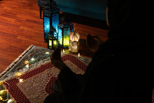 Woman Praying on a Prayer Mat, Uskudar Istanbul, Turkiye (Turkey)