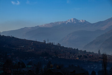 time clouds over the mountains