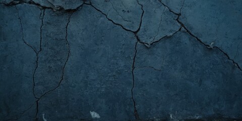 Obraz premium Black dark navy blue texture background for design. Toned rough concrete surface. A painted old building wall with cracks. Close-up. Distressed, broken, crushed, collapsed