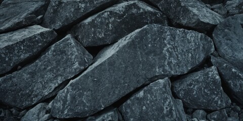 Black white rock background. Dark gray stone texture. Mountain surface