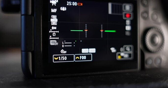 Close Up Shot Of Back Of Digital LCD Camera Screen Showing Informational Icons