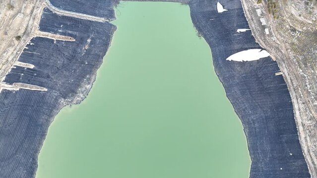 aerial drone image of artificial water dam