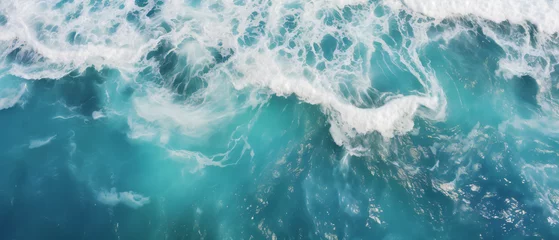 Schilderijen op glas Birdseye view of stunning ocean wave texture © Mishi